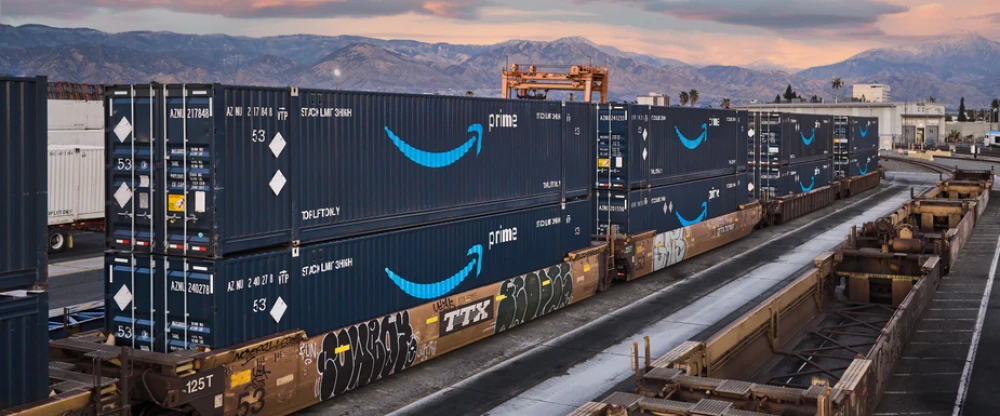 Amazon intermodal containers in a rail yard